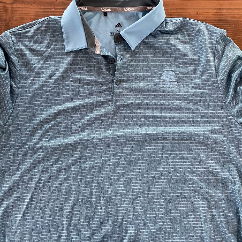 Adidas Golf Shirt. New, never worn, small logo on left chest